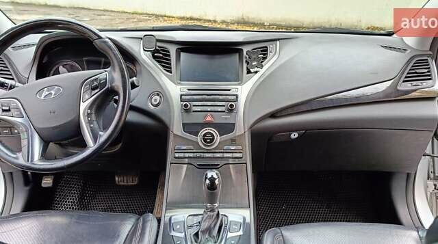Серый Хендай Грандер, объемом двигателя 3 л и пробегом 247 тыс. км за 10700 $, фото 17 на Automoto.ua