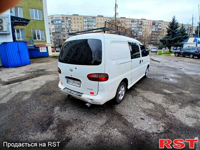 Белый Хендай Н 200 пасс., объемом двигателя 2.5 л и пробегом 300 тыс. км за 3299 $, фото 3 на Automoto.ua