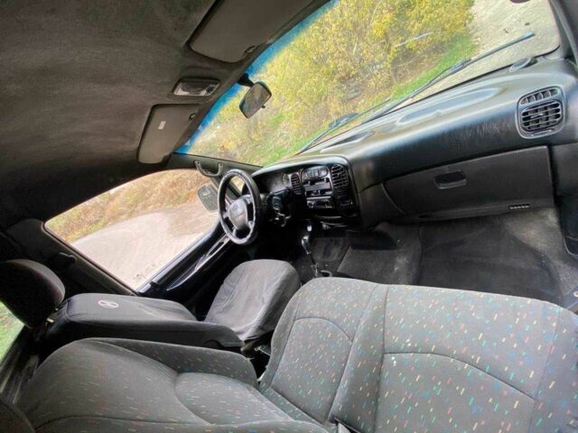 Белый Хендай Н1 (Старекс), объемом двигателя 2.5 л и пробегом 300 тыс. км за 3500 $, фото 5 на Automoto.ua