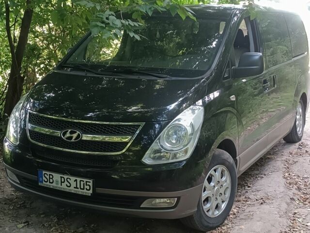Чорний Хендай Н1 (Старекс), об'ємом двигуна 2.5 л та пробігом 271 тис. км за 8251 $, фото 1 на Automoto.ua