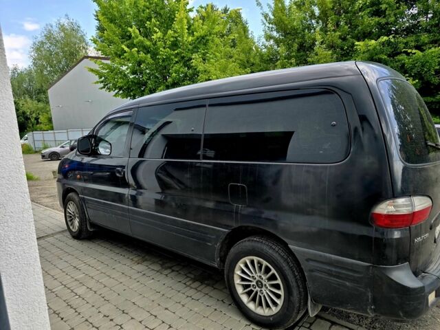 Черный Хендай Н1 (Старекс), объемом двигателя 2.4 л и пробегом 255 тыс. км за 6500 $, фото 10 на Automoto.ua