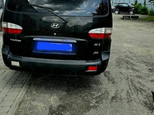 Черный Хендай Н1 (Старекс), объемом двигателя 2.4 л и пробегом 255 тыс. км за 6500 $, фото 4 на Automoto.ua