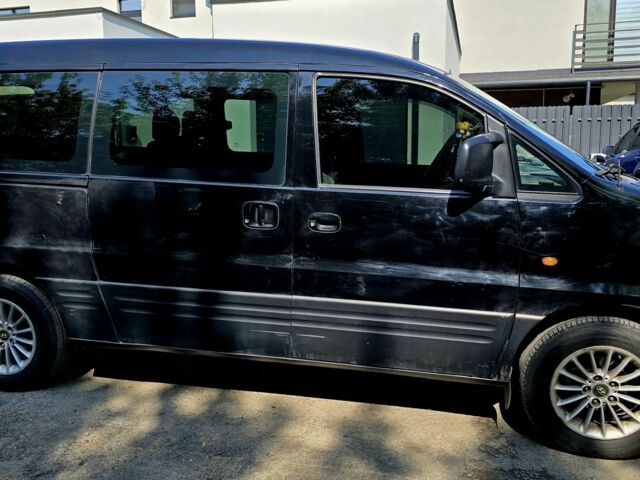 Черный Хендай Н1 (Старекс), объемом двигателя 2.4 л и пробегом 255 тыс. км за 6500 $, фото 1 на Automoto.ua