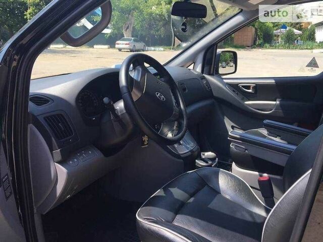 Черный Хендай Н1 (Старекс), объемом двигателя 2.5 л и пробегом 260 тыс. км за 13950 $, фото 1 на Automoto.ua