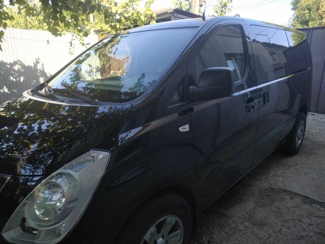 Черный Хендай Н1 (Старекс), объемом двигателя 2.5 л и пробегом 260 тыс. км за 13950 $, фото 10 на Automoto.ua