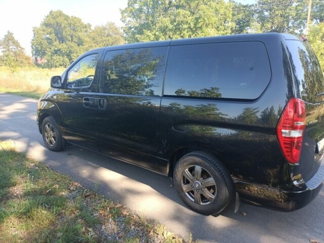 Черный Хендай Н1 (Старекс), объемом двигателя 2.5 л и пробегом 224 тыс. км за 14999 $, фото 2 на Automoto.ua