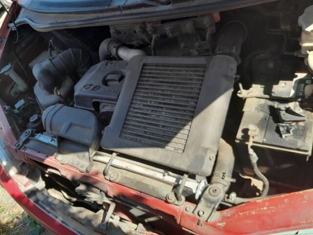 Красный Хендай Н1 (Старекс), объемом двигателя 2.5 л и пробегом 232 тыс. км за 3500 $, фото 5 на Automoto.ua