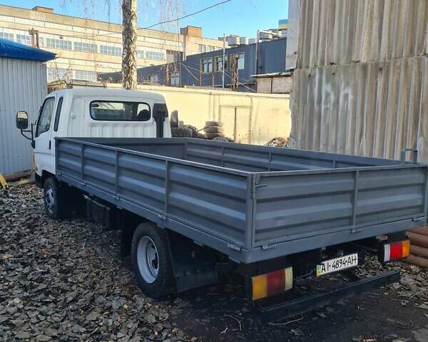 Белый Хендай НД 65, объемом двигателя 3.3 л и пробегом 215 тыс. км за 9500 $, фото 1 на Automoto.ua