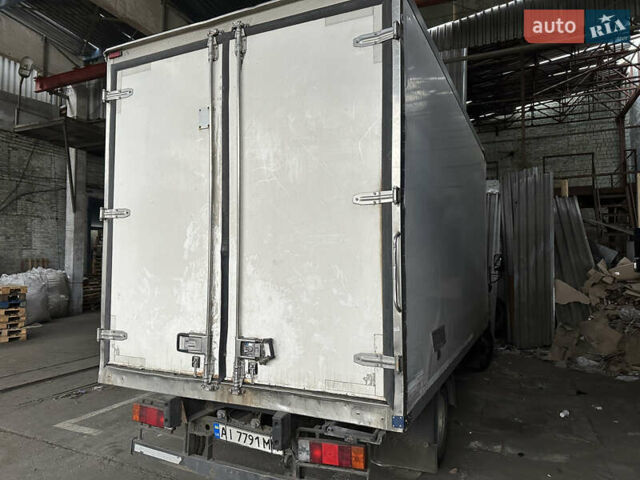 Белый Хендай НД 65, объемом двигателя 3.91 л и пробегом 244 тыс. км за 8000 $, фото 7 на Automoto.ua