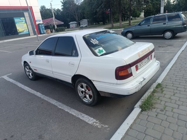 Белый Хендай Лантра, объемом двигателя 1.5 л и пробегом 200 тыс. км за 783 $, фото 2 на Automoto.ua