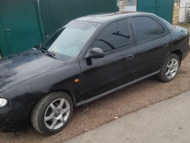 Чорний Хендай Лантра, об'ємом двигуна 1.6 л та пробігом 608 тис. км за 1500 $, фото 1 на Automoto.ua