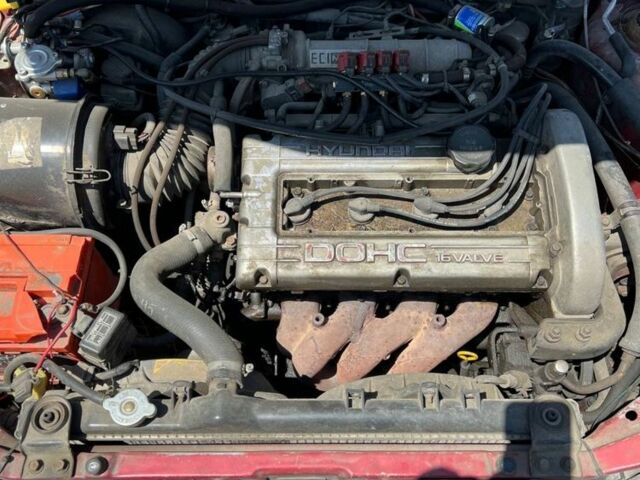 Красный Хендай Лантра, объемом двигателя 1.6 л и пробегом 260 тыс. км за 1000 $, фото 7 на Automoto.ua