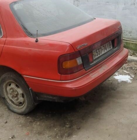 Червоний Хендай Лантра, об'ємом двигуна 1 л та пробігом 198 тис. км за 700 $, фото 5 на Automoto.ua