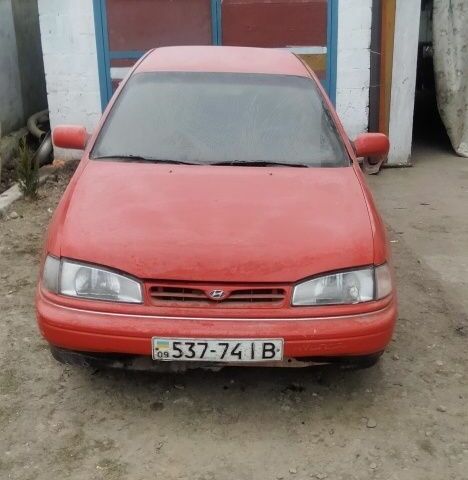 Червоний Хендай Лантра, об'ємом двигуна 1 л та пробігом 198 тис. км за 700 $, фото 4 на Automoto.ua