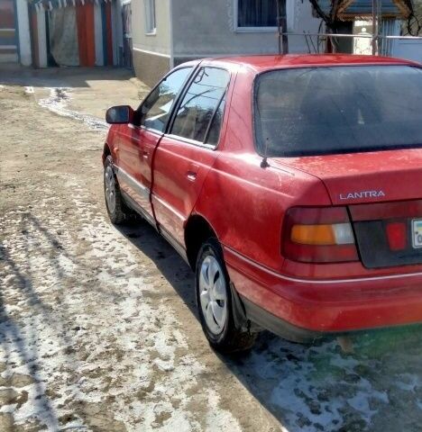 Червоний Хендай Лантра, об'ємом двигуна 1 л та пробігом 198 тис. км за 700 $, фото 23 на Automoto.ua