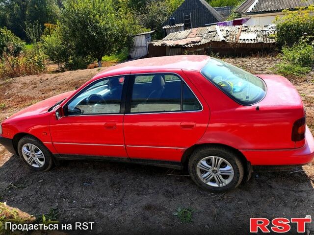 Червоний Хендай Лантра, об'ємом двигуна 1.6 л та пробігом 240 тис. км за 1200 $, фото 4 на Automoto.ua