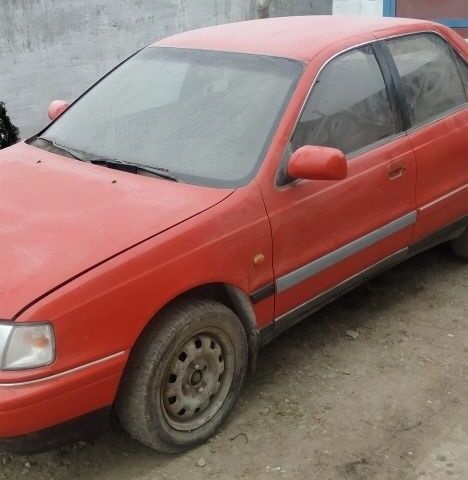 Червоний Хендай Лантра, об'ємом двигуна 1 л та пробігом 198 тис. км за 700 $, фото 2 на Automoto.ua