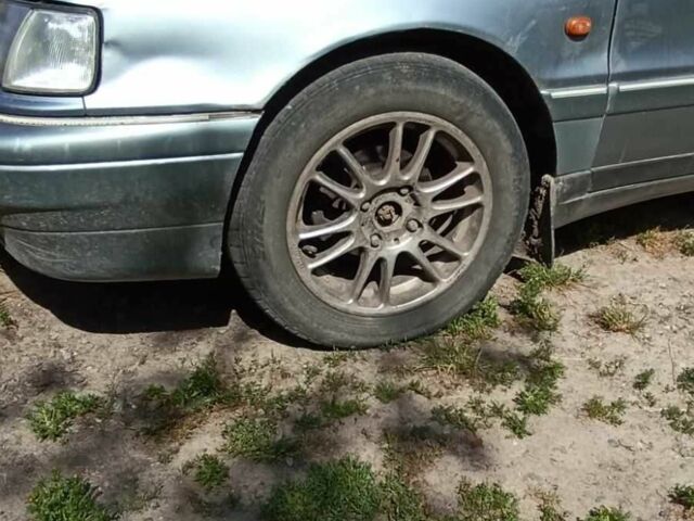Серый Хендай Лантра, объемом двигателя 1.5 л и пробегом 1000 тыс. км за 800 $, фото 3 на Automoto.ua