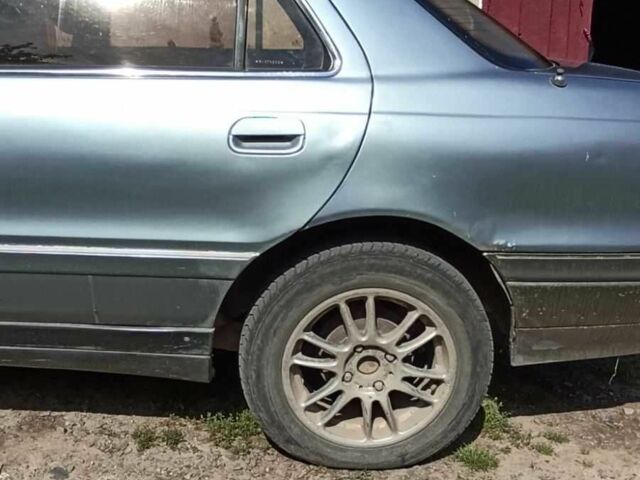 Серый Хендай Лантра, объемом двигателя 1.5 л и пробегом 1000 тыс. км за 800 $, фото 2 на Automoto.ua