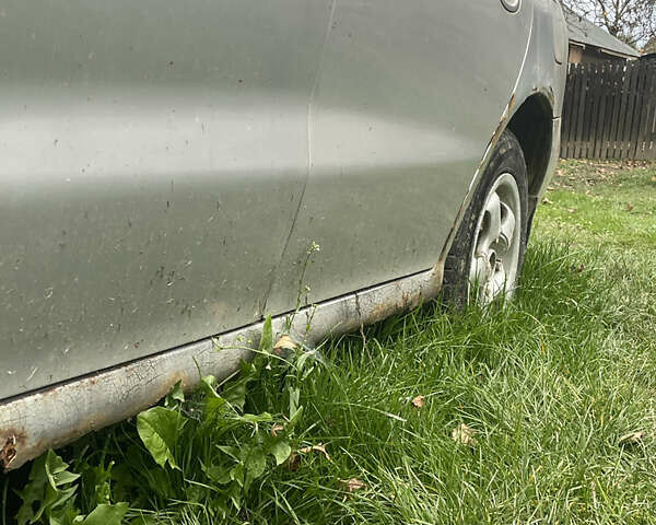 Сірий Хендай Лантра, об'ємом двигуна 1.8 л та пробігом 319 тис. км за 1000 $, фото 7 на Automoto.ua