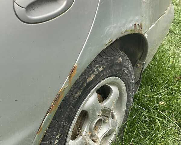 Сірий Хендай Лантра, об'ємом двигуна 1.8 л та пробігом 319 тис. км за 1000 $, фото 9 на Automoto.ua