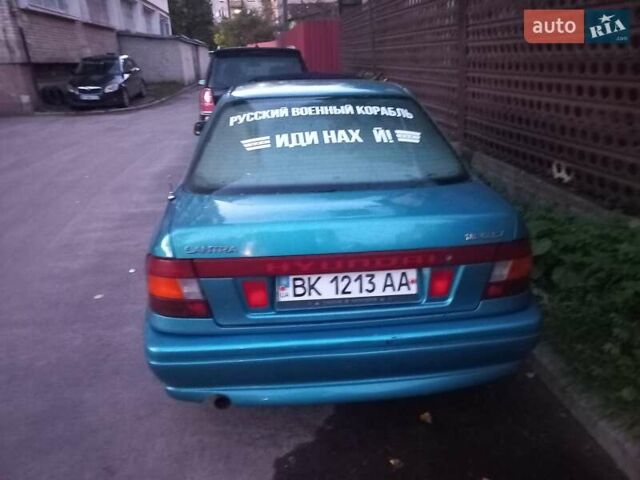 Синий Хендай Лантра, объемом двигателя 1.5 л и пробегом 317 тыс. км за 2100 $, фото 4 на Automoto.ua
