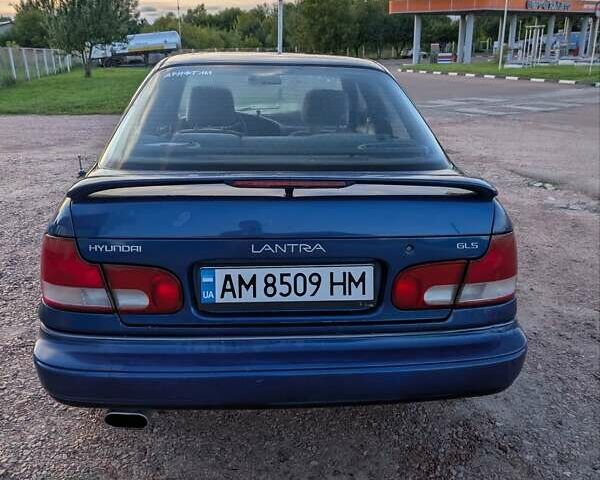 Синій Хендай Лантра, об'ємом двигуна 2 л та пробігом 423 тис. км за 2400 $, фото 1 на Automoto.ua