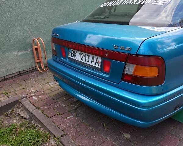 Синий Хендай Лантра, объемом двигателя 1.5 л и пробегом 317 тыс. км за 2100 $, фото 7 на Automoto.ua