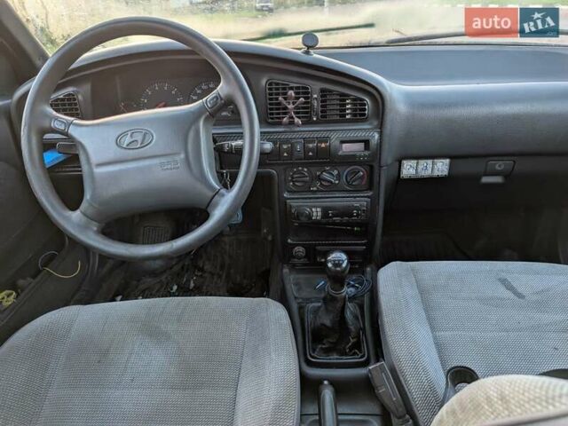 Синій Хендай Лантра, об'ємом двигуна 2 л та пробігом 423 тис. км за 2400 $, фото 11 на Automoto.ua