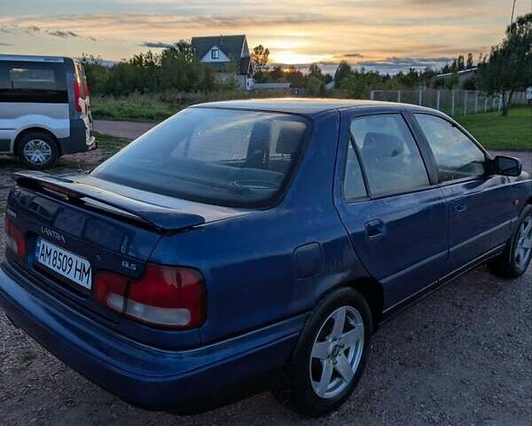Синій Хендай Лантра, об'ємом двигуна 2 л та пробігом 423 тис. км за 2400 $, фото 2 на Automoto.ua