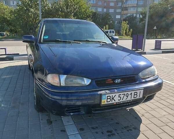Синий Хендай Лантра, объемом двигателя 1.47 л и пробегом 320 тыс. км за 999 $, фото 2 на Automoto.ua