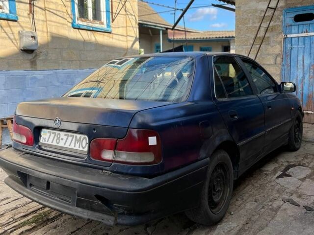 Синий Хендай Лантра, объемом двигателя 1.5 л и пробегом 450 тыс. км за 1500 $, фото 4 на Automoto.ua