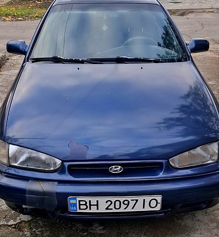 Синий Хендай Лантра, объемом двигателя 1.6 л и пробегом 232 тыс. км за 1200 $, фото 4 на Automoto.ua