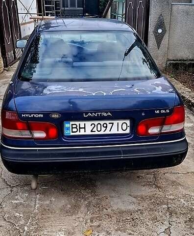 Синий Хендай Лантра, объемом двигателя 1.6 л и пробегом 232 тыс. км за 1200 $, фото 2 на Automoto.ua