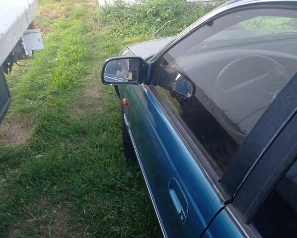 Зеленый Хендай Лантра, объемом двигателя 1.6 л и пробегом 200 тыс. км за 900 $, фото 4 на Automoto.ua