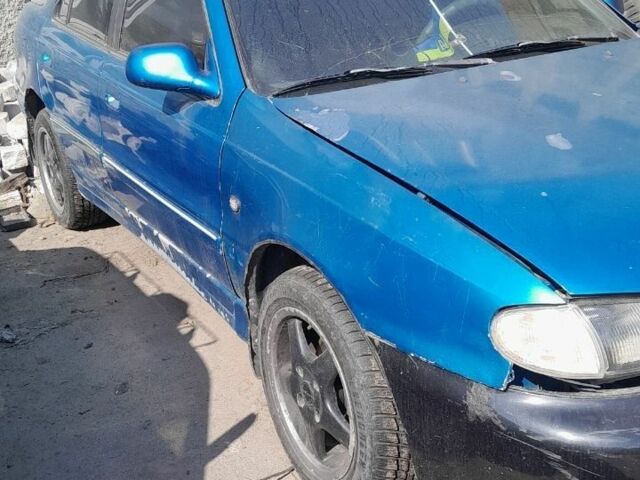 Зеленый Хендай Лантра, объемом двигателя 1 л и пробегом 268 тыс. км за 641 $, фото 6 на Automoto.ua