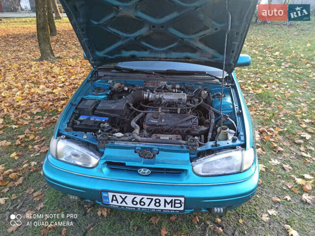 Зелений Хендай Лантра, об'ємом двигуна 1.47 л та пробігом 100 тис. км за 1500 $, фото 4 на Automoto.ua