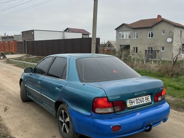 Зеленый Хендай Лантра, объемом двигателя 1.5 л и пробегом 200 тыс. км за 700 $, фото 4 на Automoto.ua