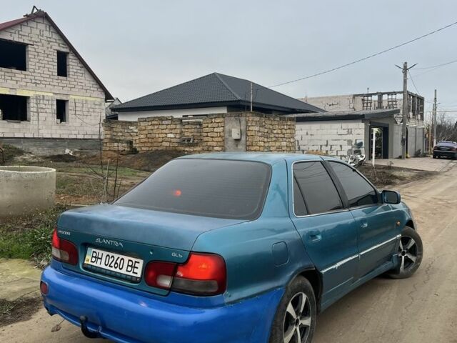 Зеленый Хендай Лантра, объемом двигателя 1.5 л и пробегом 200 тыс. км за 700 $, фото 3 на Automoto.ua