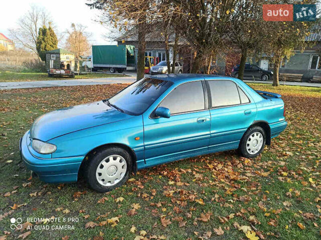 Зелений Хендай Лантра, об'ємом двигуна 1.47 л та пробігом 100 тис. км за 1500 $, фото 7 на Automoto.ua