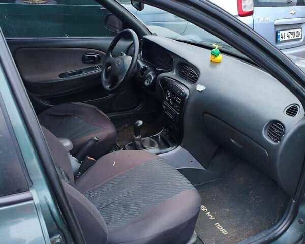 Зелений Хендай Лантра, об'ємом двигуна 1.6 л та пробігом 245 тис. км за 1600 $, фото 11 на Automoto.ua