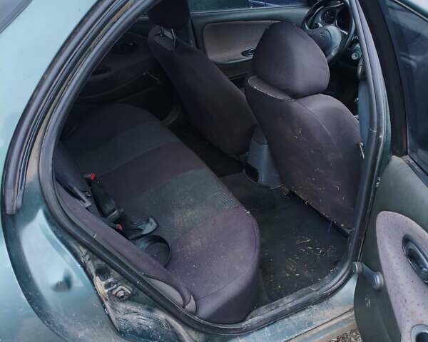 Зелений Хендай Лантра, об'ємом двигуна 1.6 л та пробігом 245 тис. км за 1600 $, фото 12 на Automoto.ua