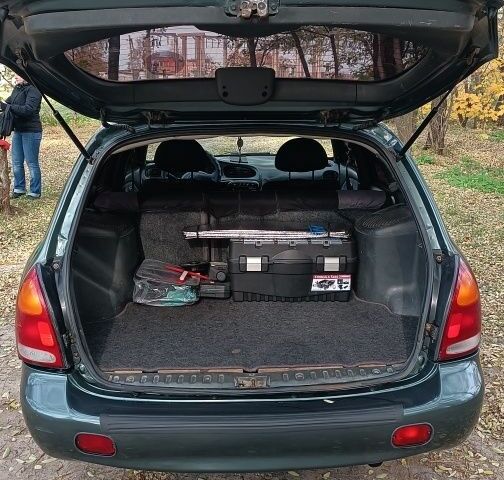 Зеленый Хендай Лантра, объемом двигателя 1.6 л и пробегом 240 тыс. км за 2500 $, фото 5 на Automoto.ua