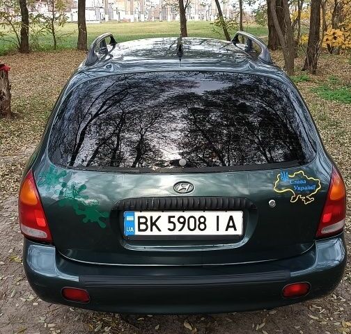 Зеленый Хендай Лантра, объемом двигателя 1.6 л и пробегом 240 тыс. км за 2500 $, фото 4 на Automoto.ua