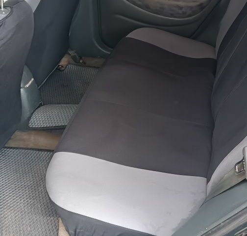 Зеленый Хендай Лантра, объемом двигателя 1.6 л и пробегом 240 тыс. км за 2500 $, фото 8 на Automoto.ua