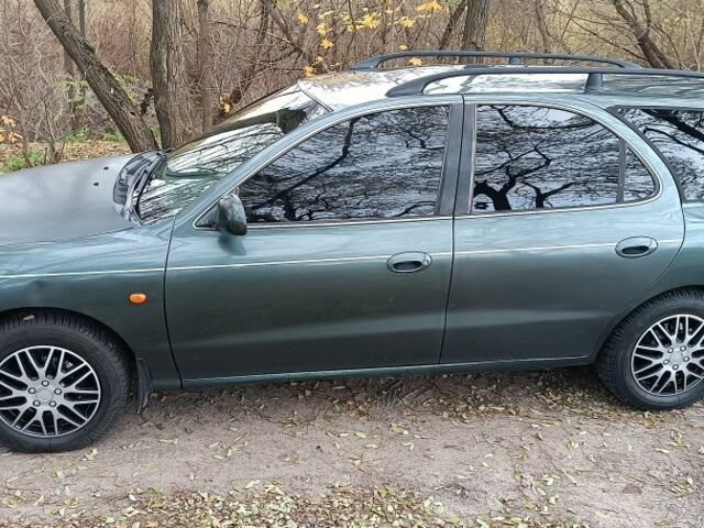 Зеленый Хендай Лантра, объемом двигателя 1.6 л и пробегом 240 тыс. км за 2500 $, фото 3 на Automoto.ua