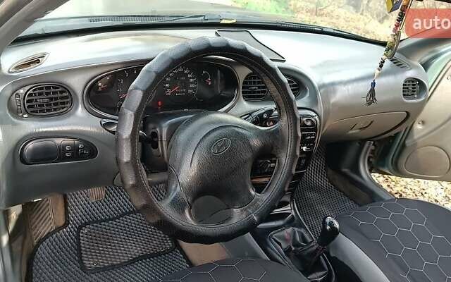 Зелений Хендай Лантра, об'ємом двигуна 1.6 л та пробігом 240 тис. км за 2500 $, фото 8 на Automoto.ua