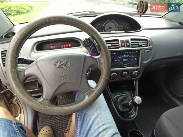 Бежевый Хендай Матрикс, объемом двигателя 1.5 л и пробегом 206 тыс. км за 3800 $, фото 23 на Automoto.ua