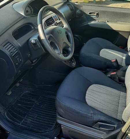 Черный Хендай Матрикс, объемом двигателя 1.6 л и пробегом 272 тыс. км за 4800 $, фото 12 на Automoto.ua