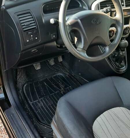 Черный Хендай Матрикс, объемом двигателя 1.6 л и пробегом 272 тыс. км за 4799 $, фото 11 на Automoto.ua